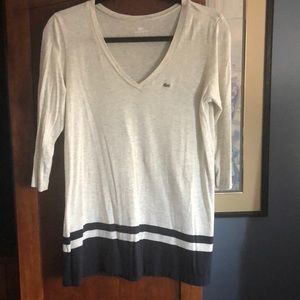 Gray and navy blue Lacoste shirt